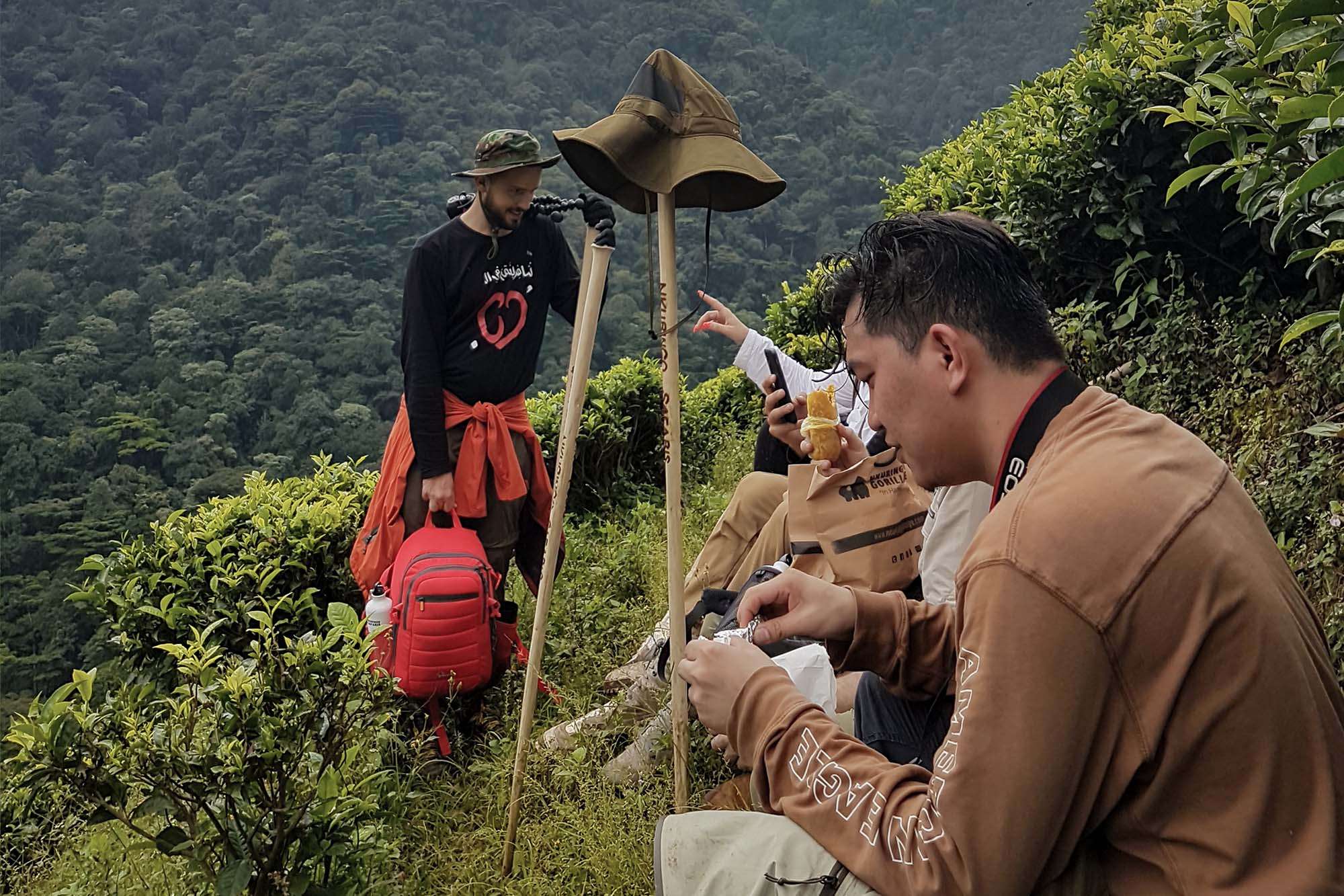 Taking a break from gorilla trekking for a snack outside the rainforest - meeting and seeing the mythical mountain gorillas in Uganda