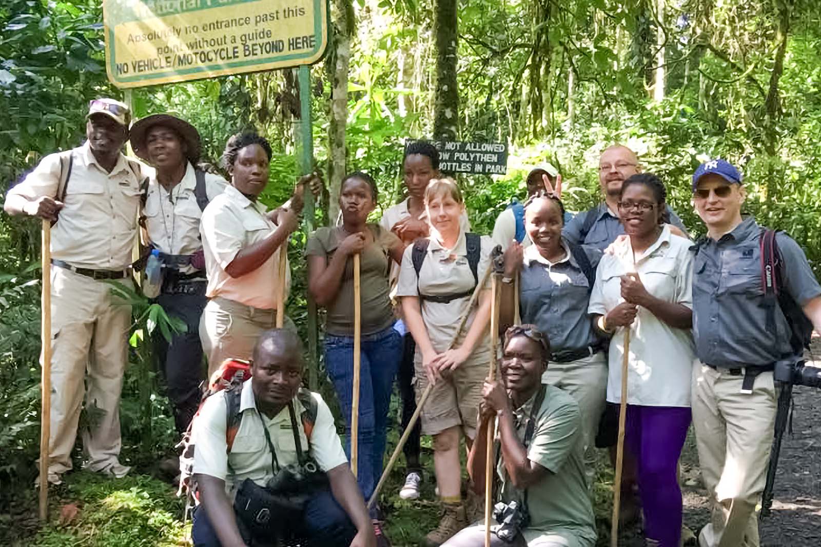 Local experts in Uganda who plan safaris pausing for a photo in Bwindi
